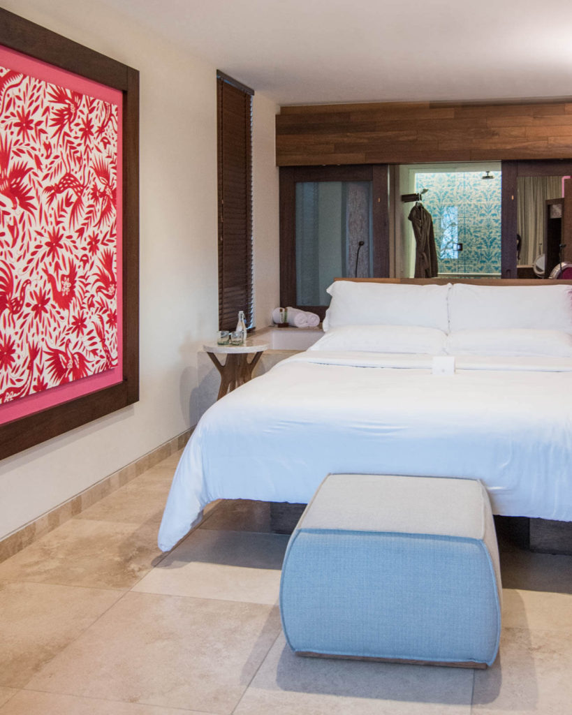 Bed in suite at Hotel Xcaret Mexico