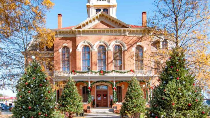 Main historic square in Monroe, Georgia, decorated with Christmas trees for the holiday season